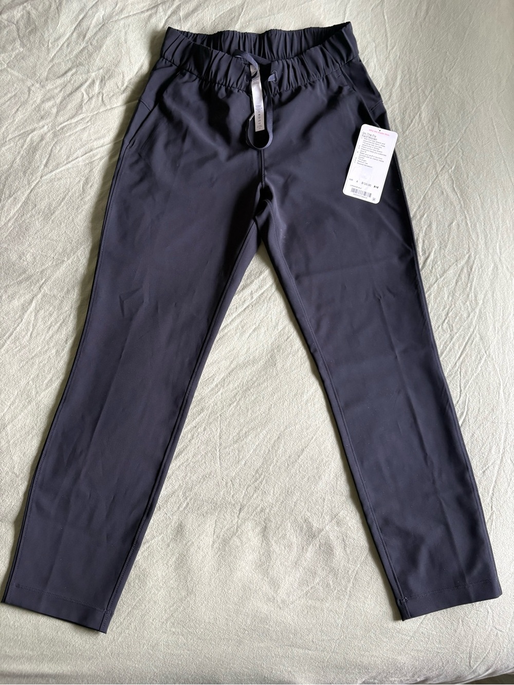 NWT Lululemon On The Fly Pant Woven 7/8 Length Black Size 4 Travel Work Pants